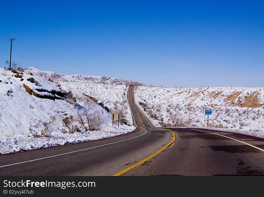 Desert road in snow