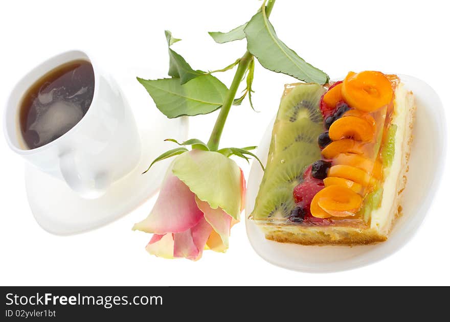 Close-up curd cake with fruits and rose, isolated on white