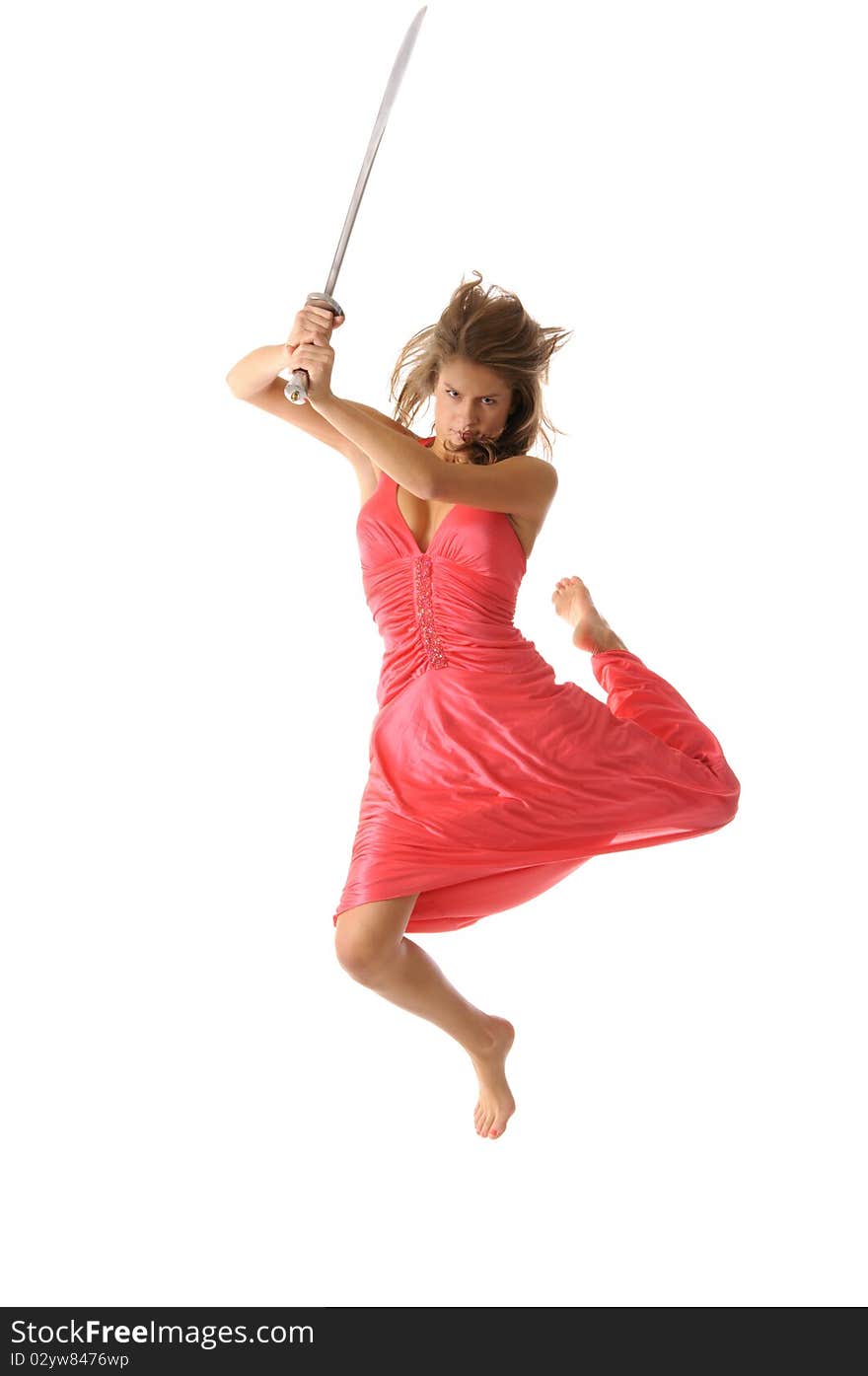 Young woman in jump with sword isolated on the white