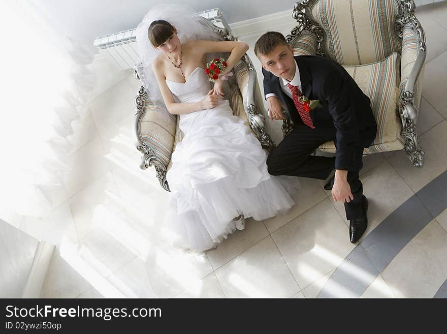 Bride and groom in luxury interior. Bride and groom in luxury interior