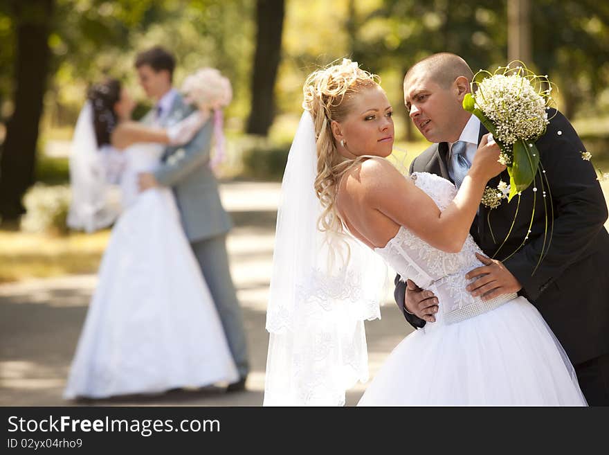 Happy bride and groom at the wedding walk