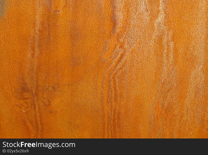 Rusty metal texture, orange background