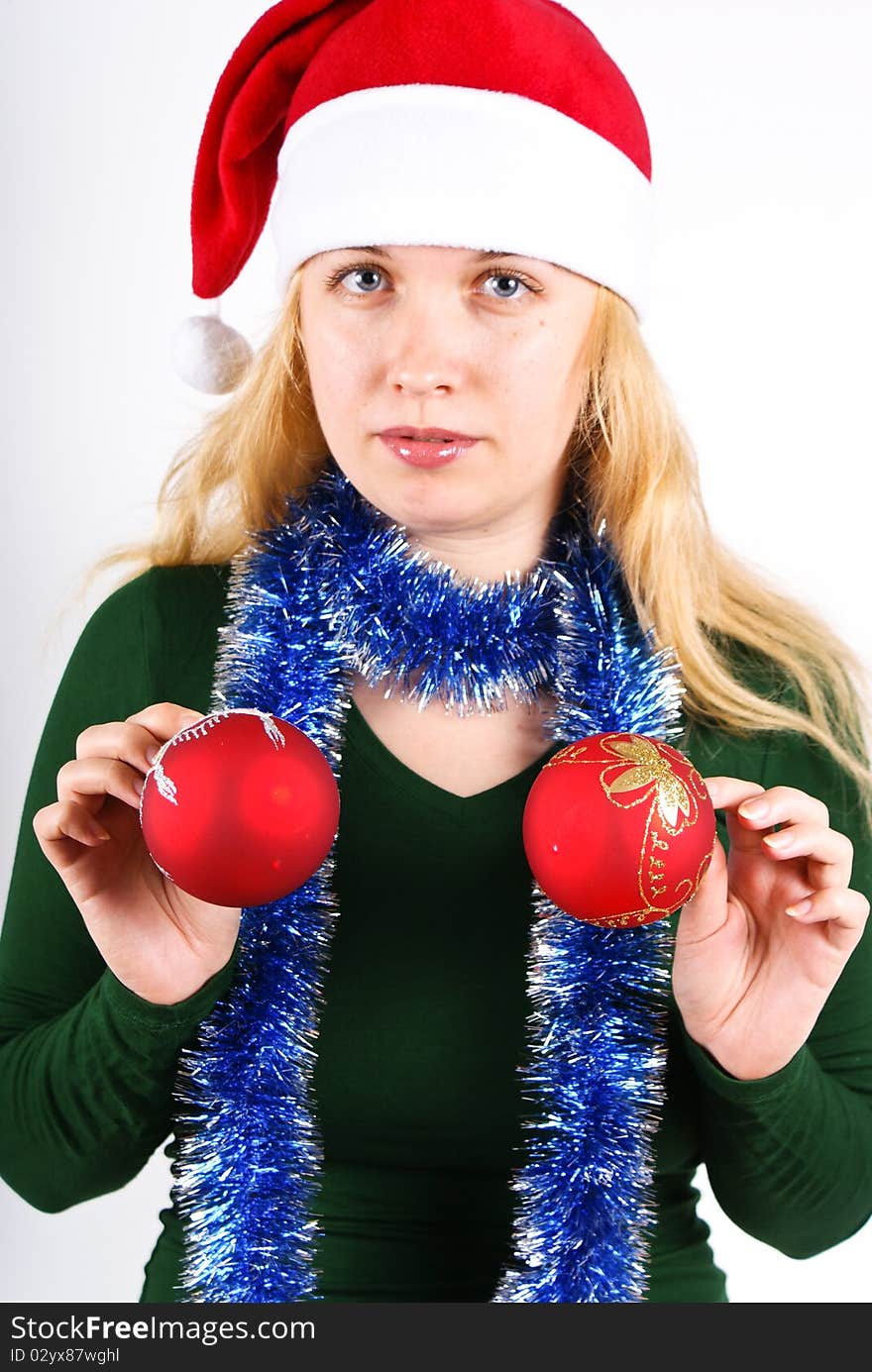 Santa girl with red x-mas balls. Santa girl with red x-mas balls