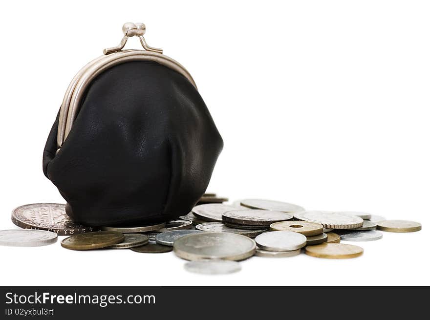 Old coins and purse isolated on white