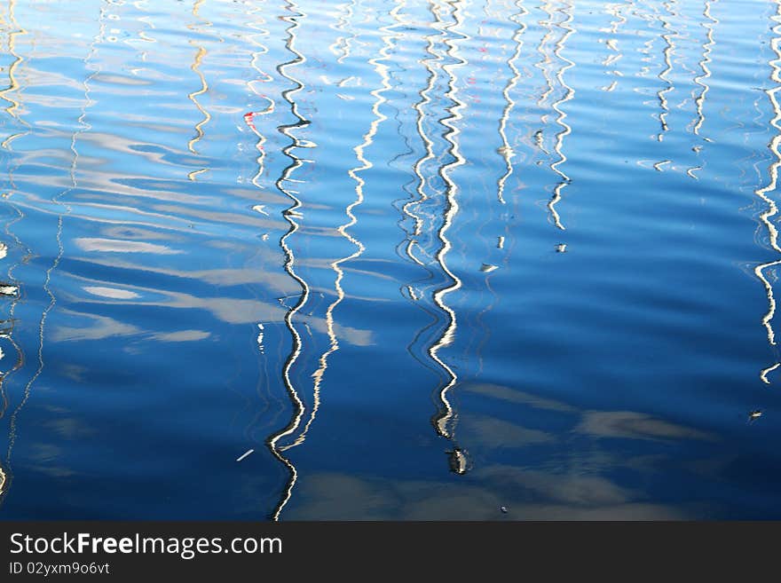 Reflection of boats in the sea water. Reflection of boats in the sea water