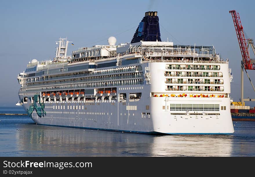 Large cruise liner leaving the port