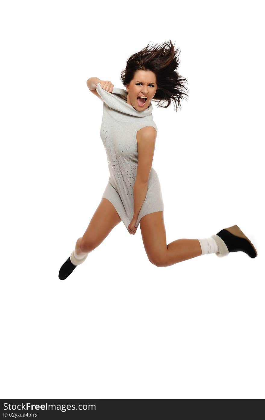 Dynamic beautiful wild winter woman jumping and screaming. isolated on white background. Dynamic beautiful wild winter woman jumping and screaming. isolated on white background