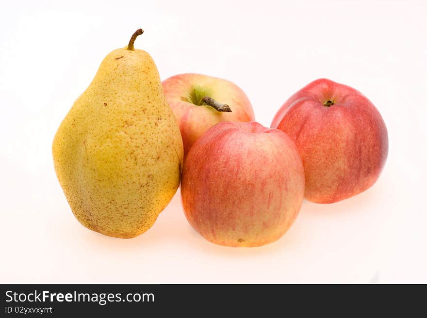 Fresh ripe apples and pears close-up on a white background. Fresh ripe apples and pears close-up on a white background