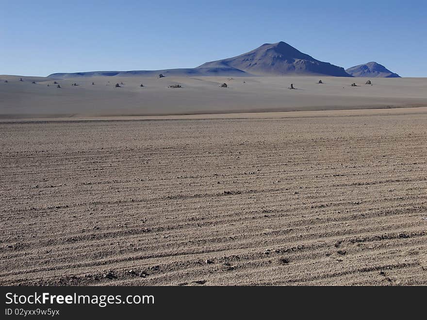 Unevenly fallen rocks of the mountains in Dali's desert, Bolivia