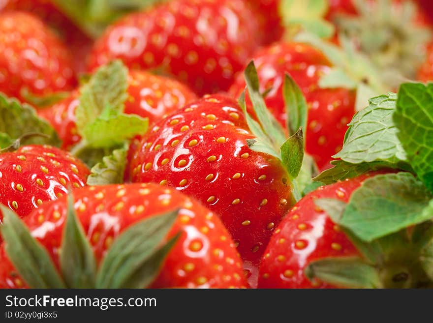 Strawberry with green leaf on white background