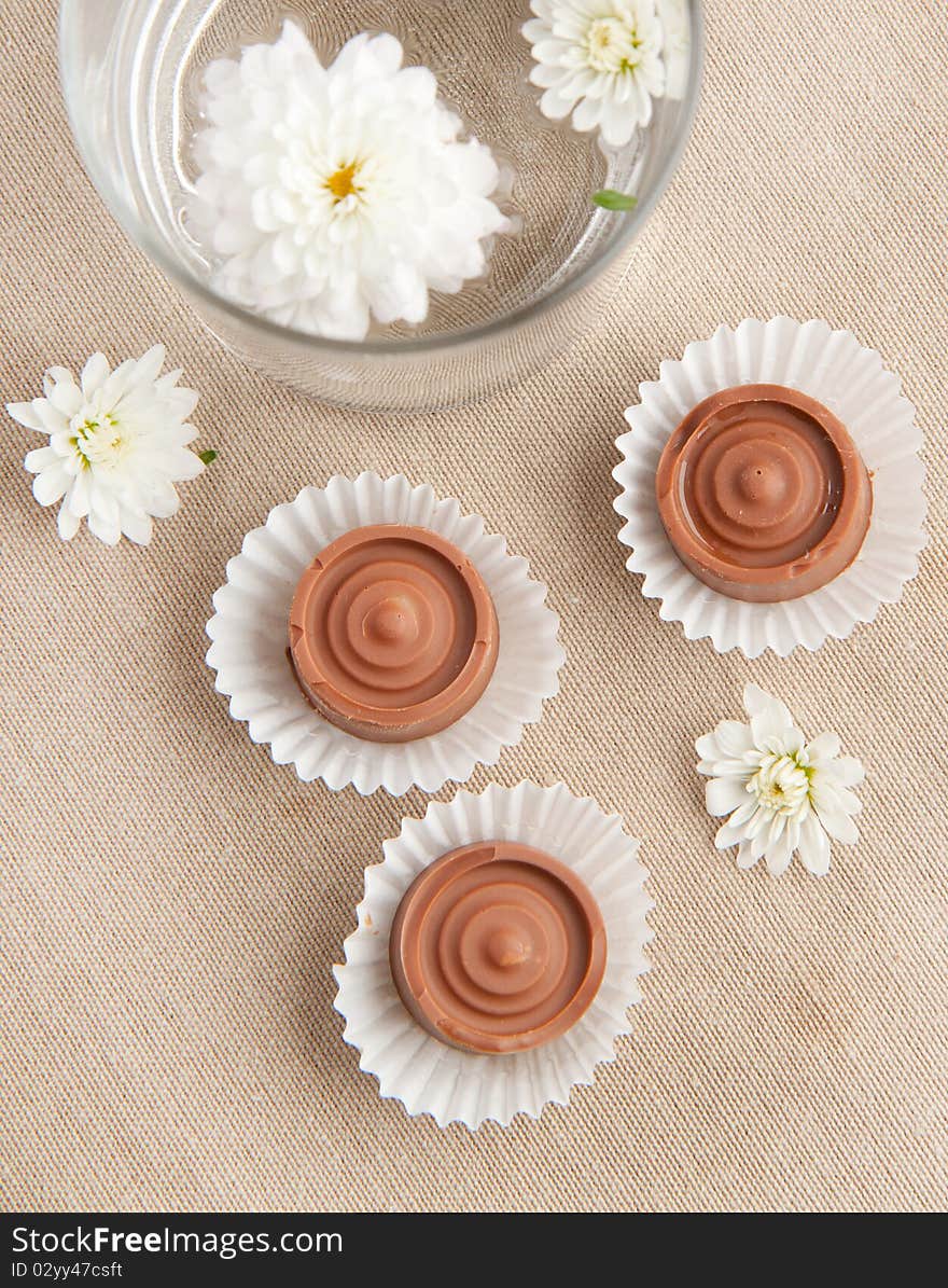 Homemade sweet chocolatewith white flowers