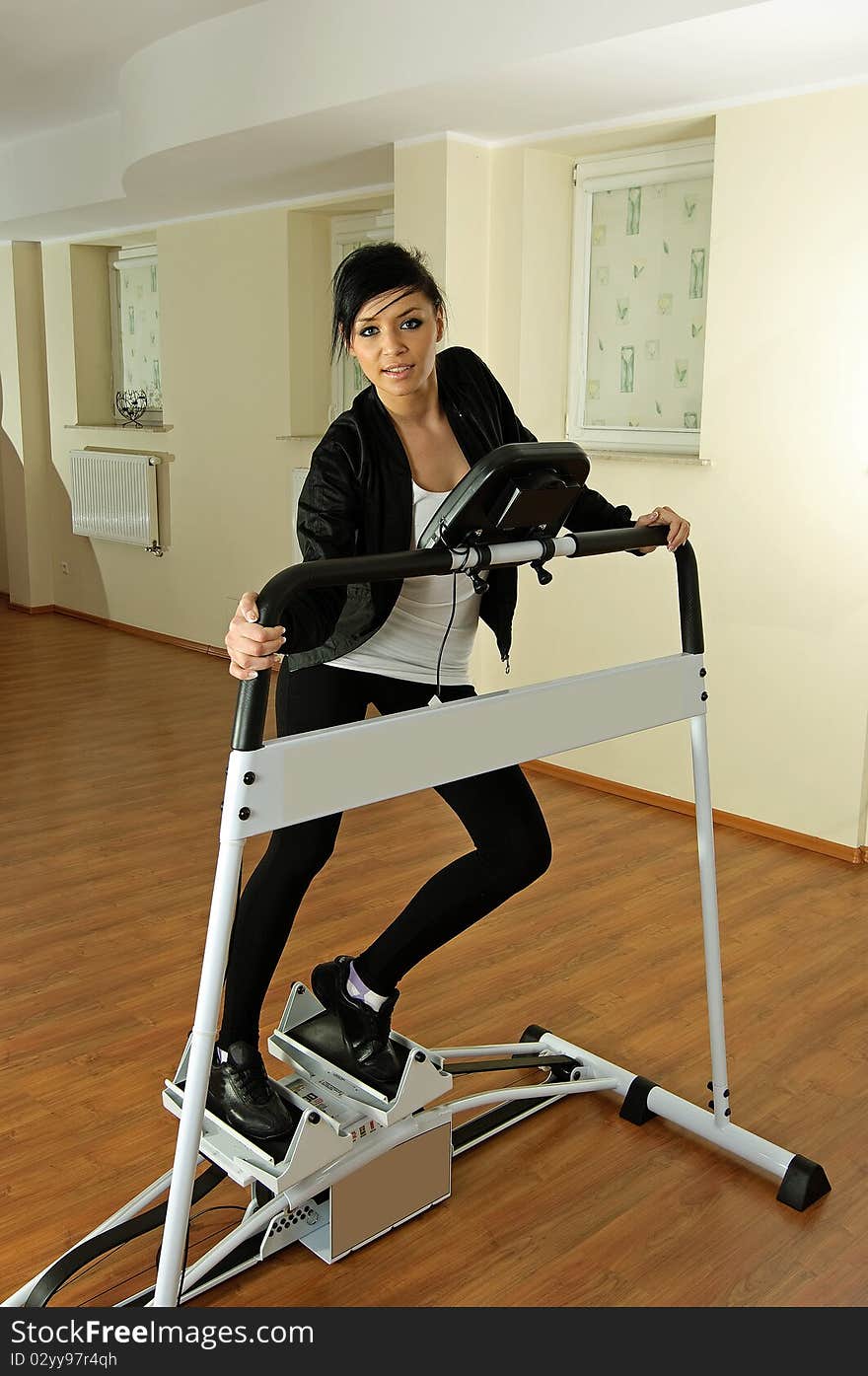 Young woman in gym.