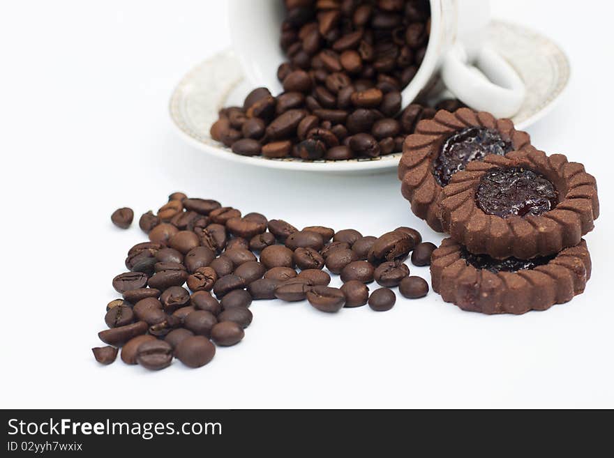 Coffee beans in shape of heart isolated in white