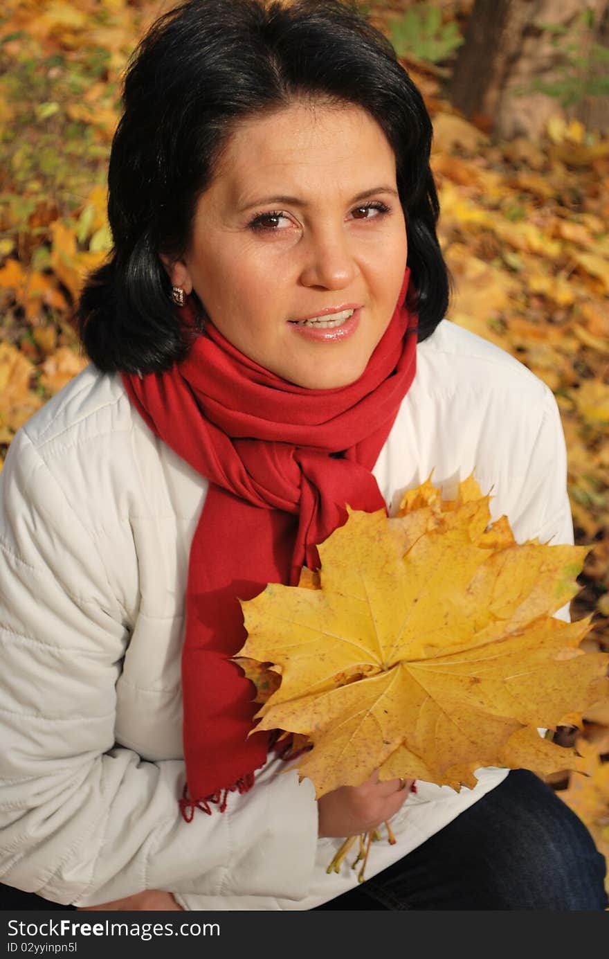 Young woman in the autumn park. Young woman in the autumn park