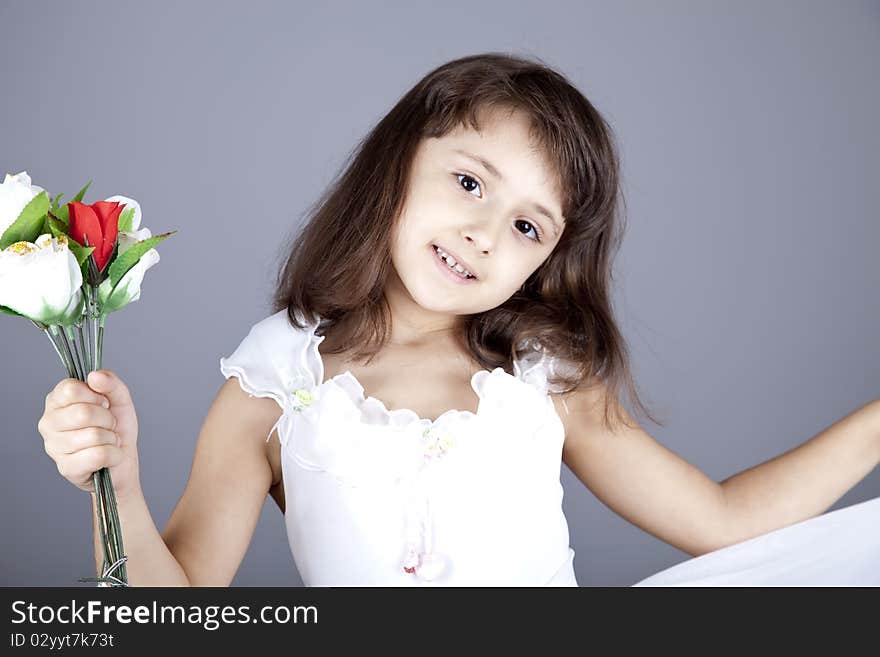 Young girl in dress and flowers.