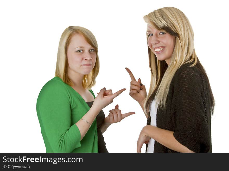 Two young caucasian girlfriends having fun together isolated over white background. Two young caucasian girlfriends having fun together isolated over white background