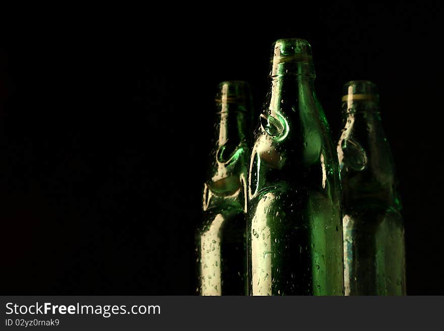 Vintage style soda bottles in dark background