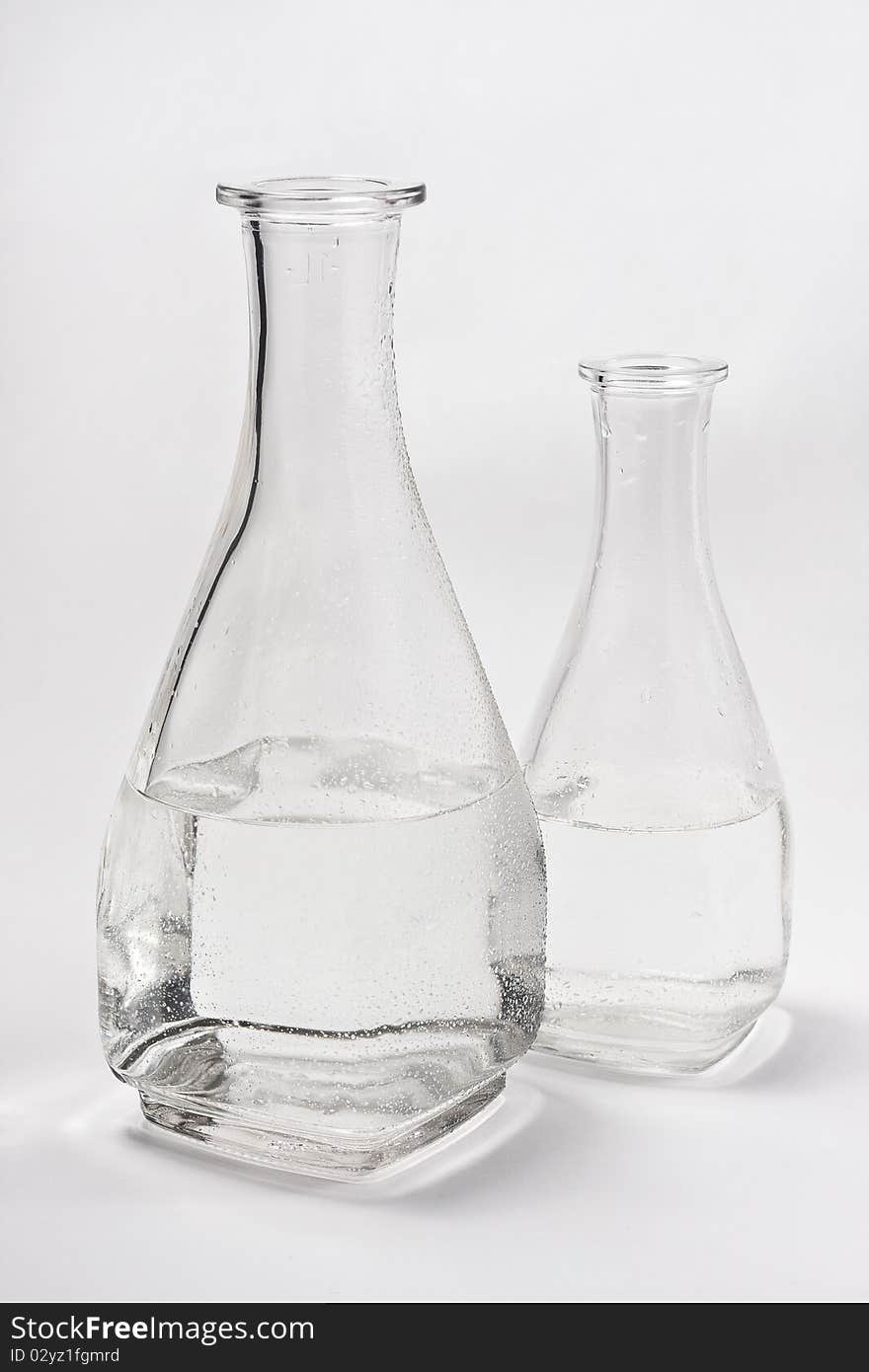 Decanter whith water on white background. Decanter whith water on white background