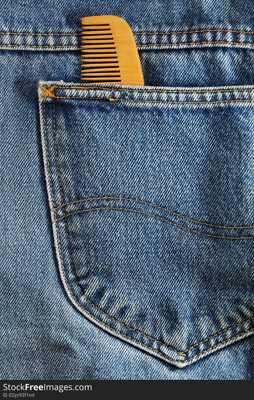 Texture of blue color jeans with pocket and comb. Texture of blue color jeans with pocket and comb