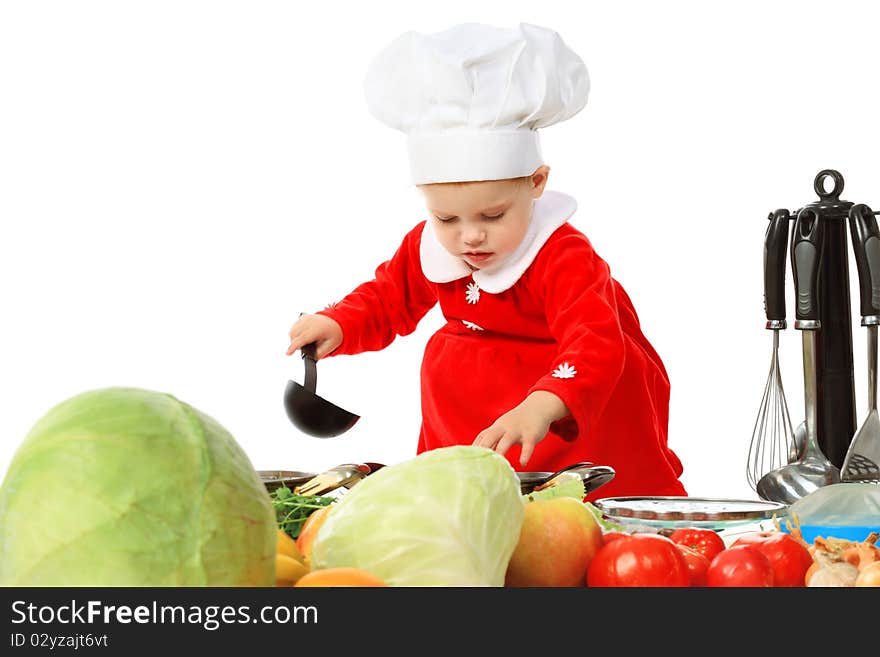 Portrait of a little girl in a cook cap. Isolated over white background.