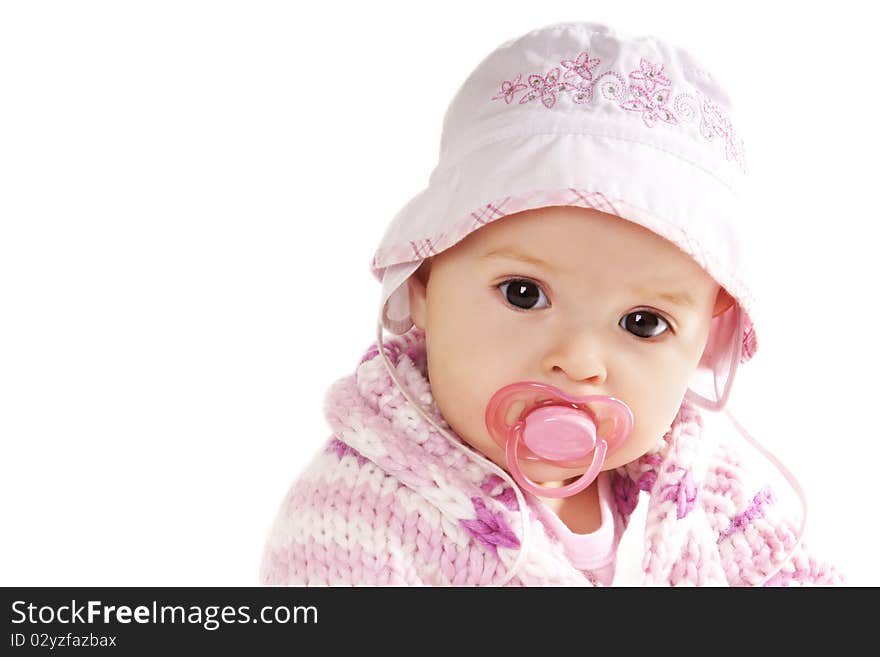 Portrait if pretty baby girl with baby's dummy isolated on white background