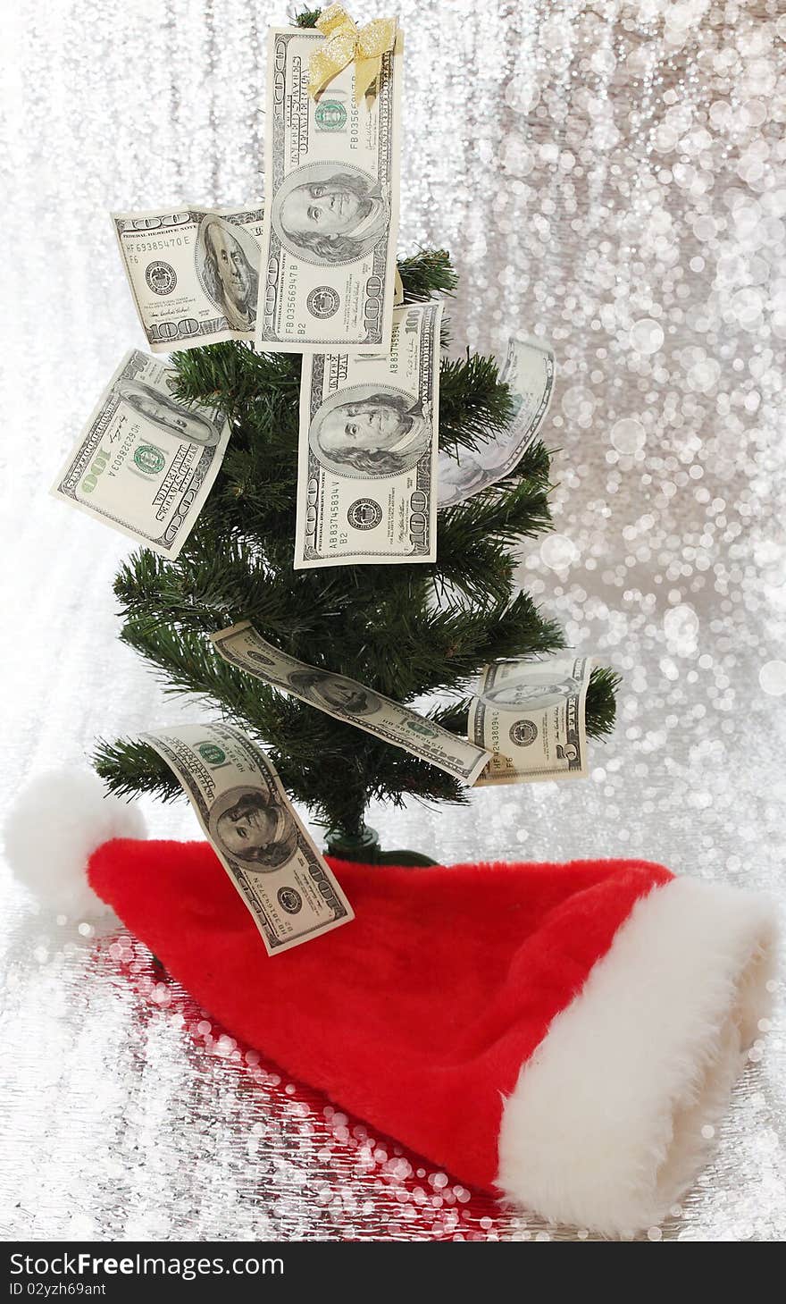 Christmas tree is decorated with the money