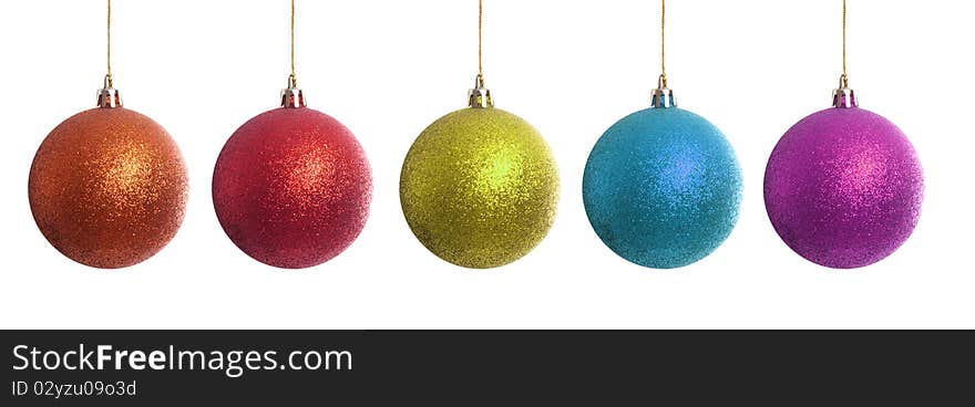 Orange, blue, red, green, blue, and purple Christmas balls isolated on white. Orange, blue, red, green, blue, and purple Christmas balls isolated on white