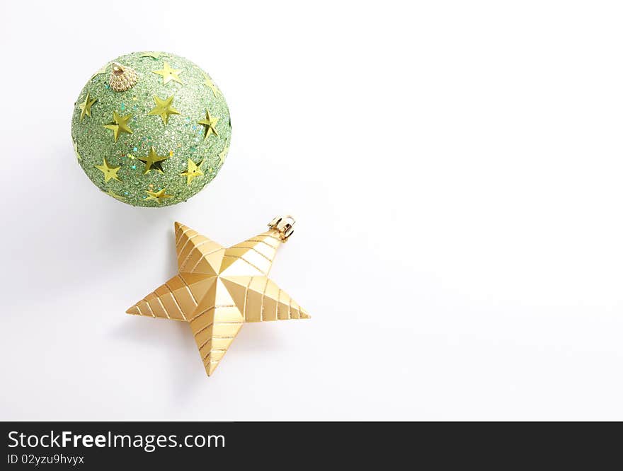 Christmas card with green ball and a star over white background. Christmas card with green ball and a star over white background