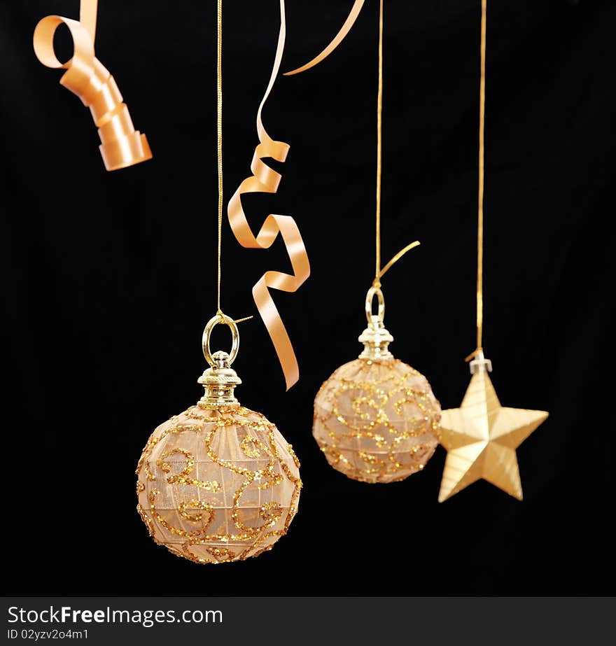 Christmas stars and decoration balls over black background. Christmas Card