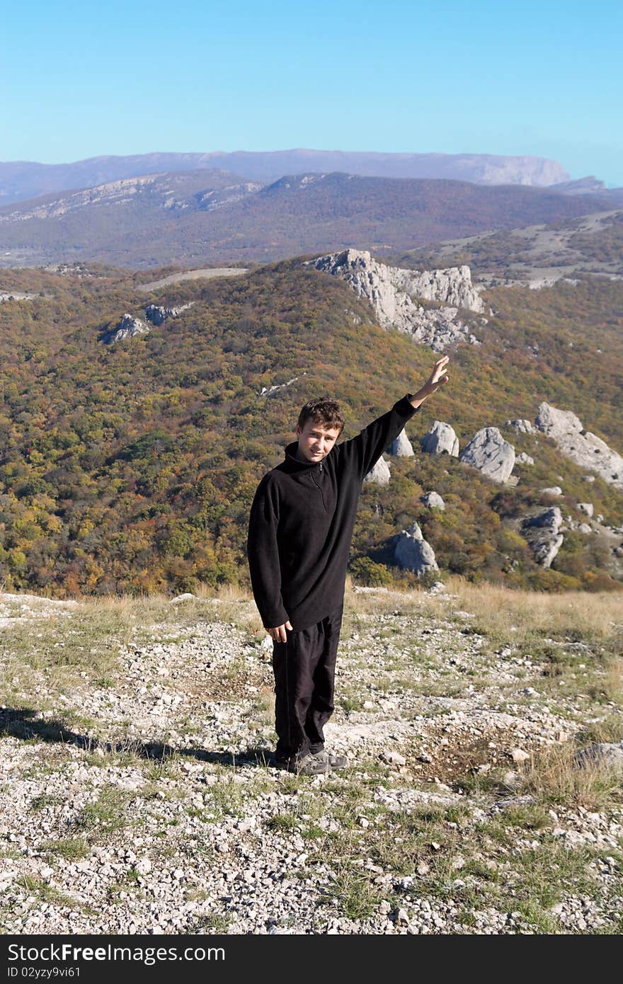 Teenager and mountains.