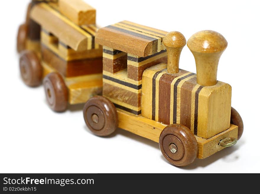 Wooden toy train isolated on white background