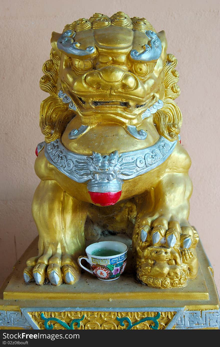 The model lion stone in china town, Thailand. The model lion stone in china town, Thailand