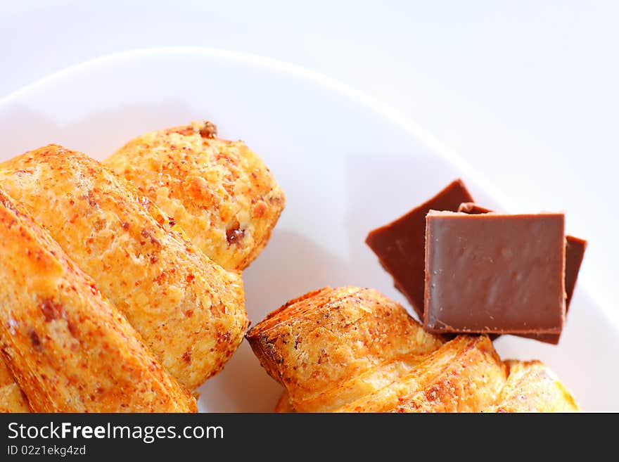 Fresh croissants on white background