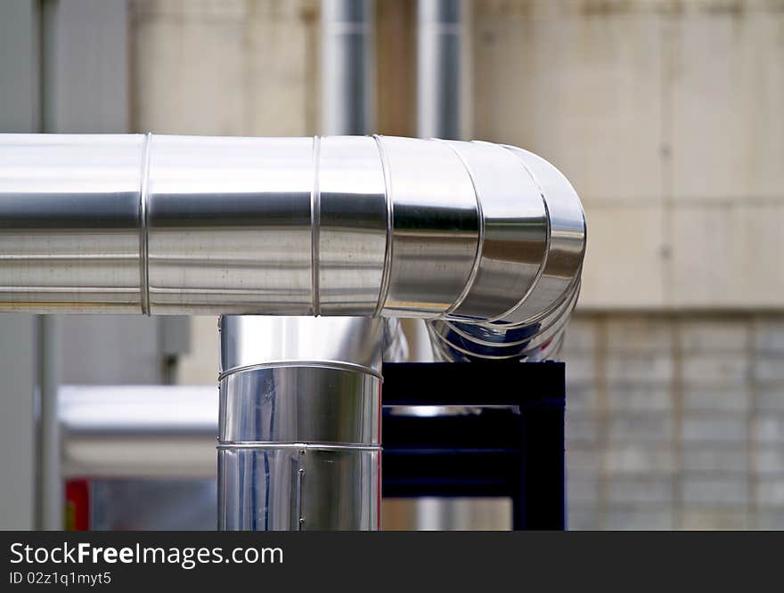 Bent steel tubes shining up close