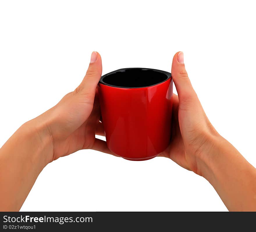 Red cup in hand on white background