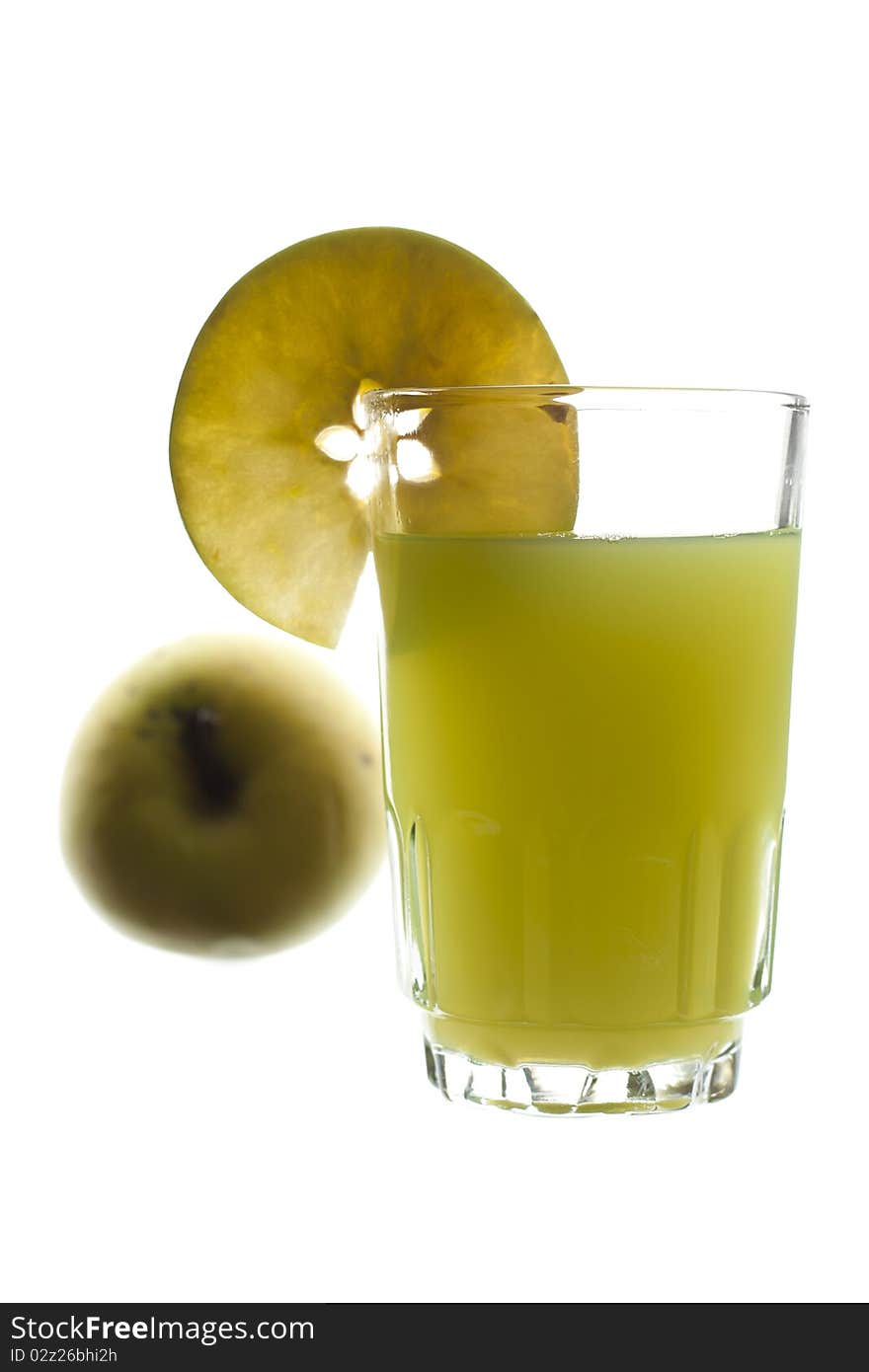 Glass of freshly squeeze green apple juice