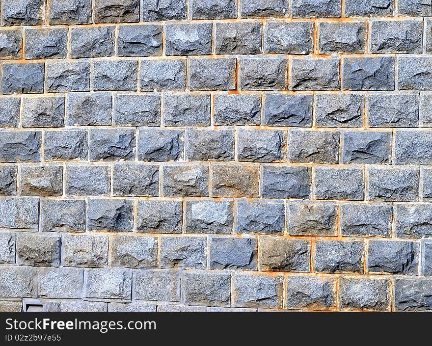 Detail of stone brick wall in sunshine Photo taken on: October 30 , 2010