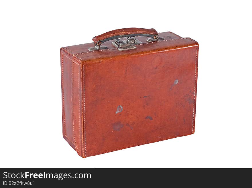 Small old fashioned brown leather suitcase, isolated on white, at an angle. Small old fashioned brown leather suitcase, isolated on white, at an angle