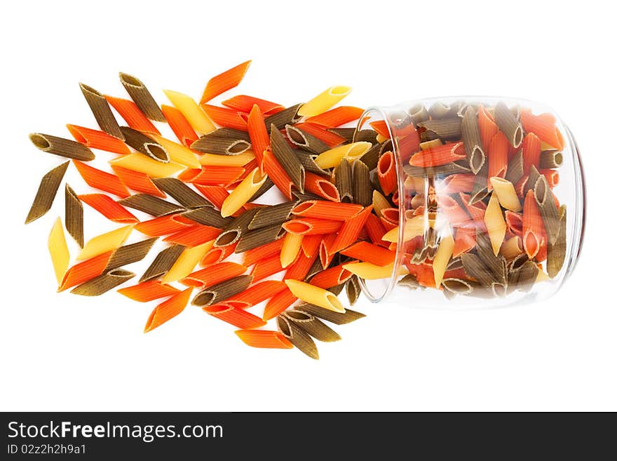 Pasta in glass jar on a white background