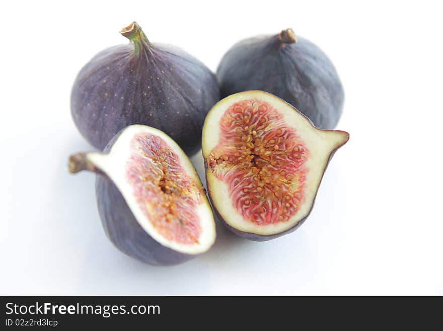 Fresh figs on white background