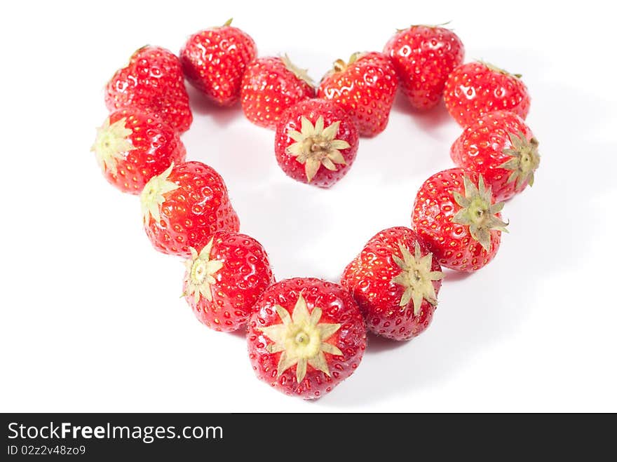 Strawberry heart isolated on white background