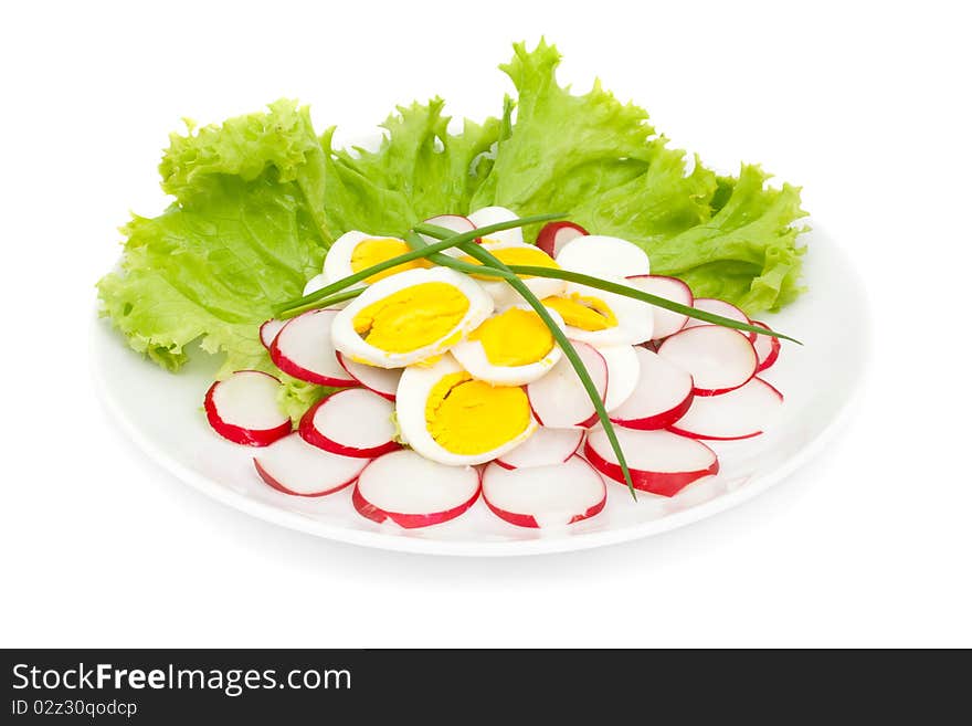 Salad of radish and eggs isolated on white