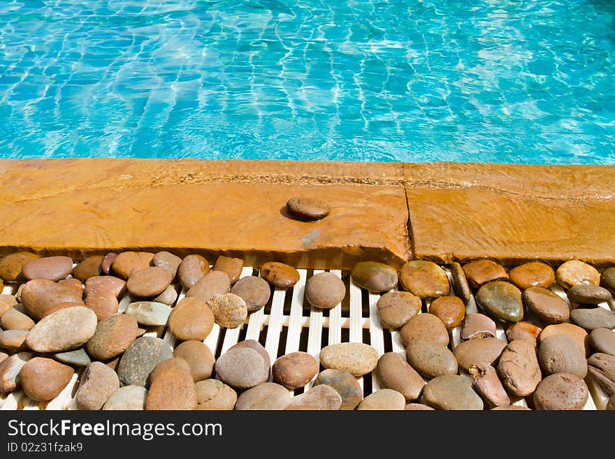 Stone of a side of a pool. Stone of a side of a pool