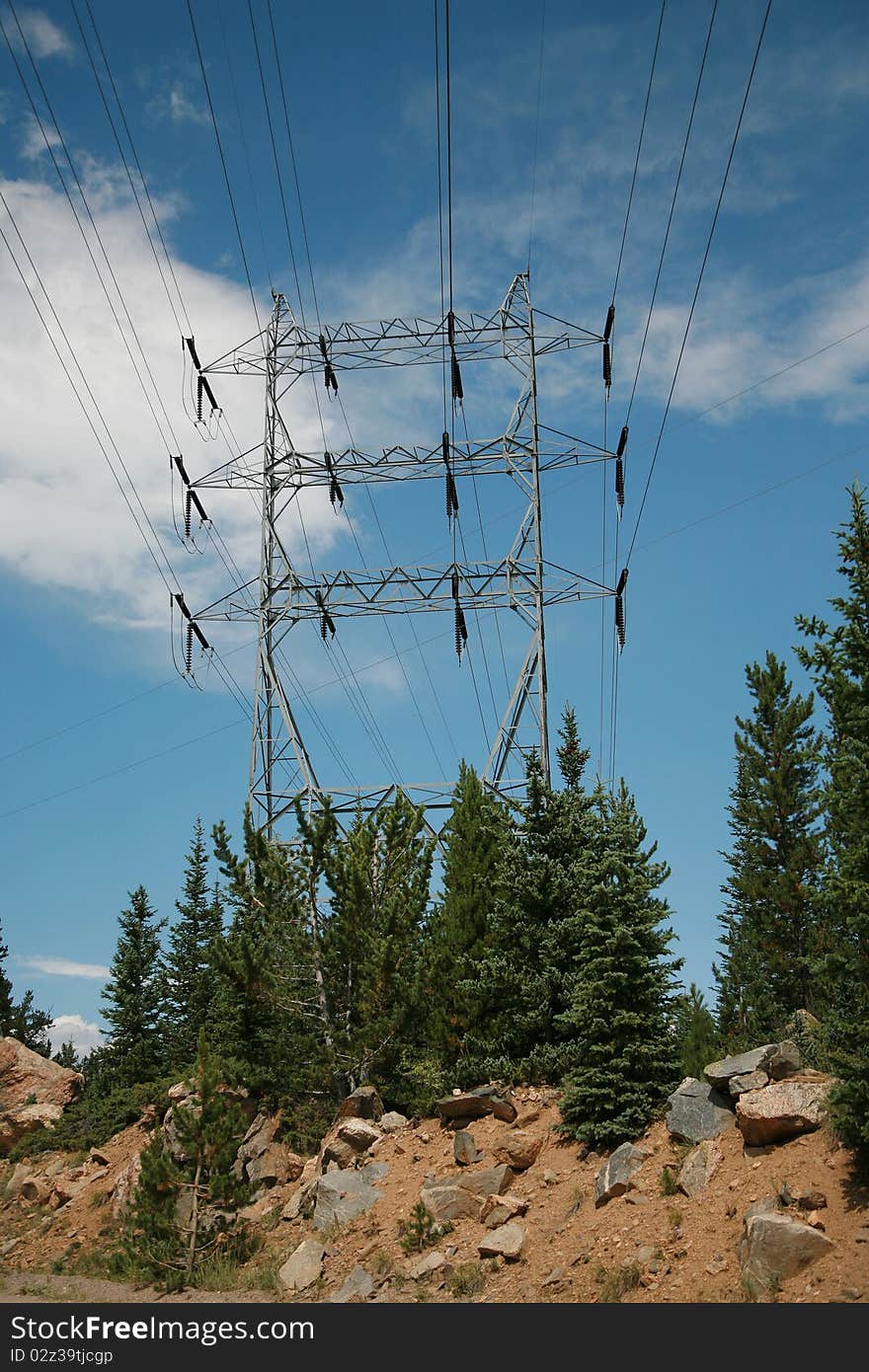 A high power electrical tower in the Colorado Rocky Mountains. A high power electrical tower in the Colorado Rocky Mountains