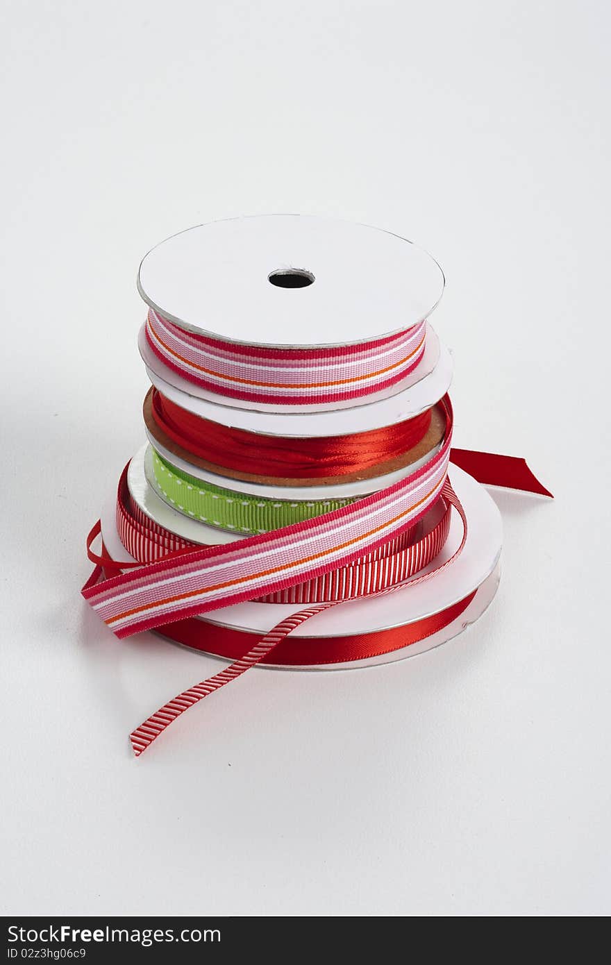 Five spools of ribbon stacked