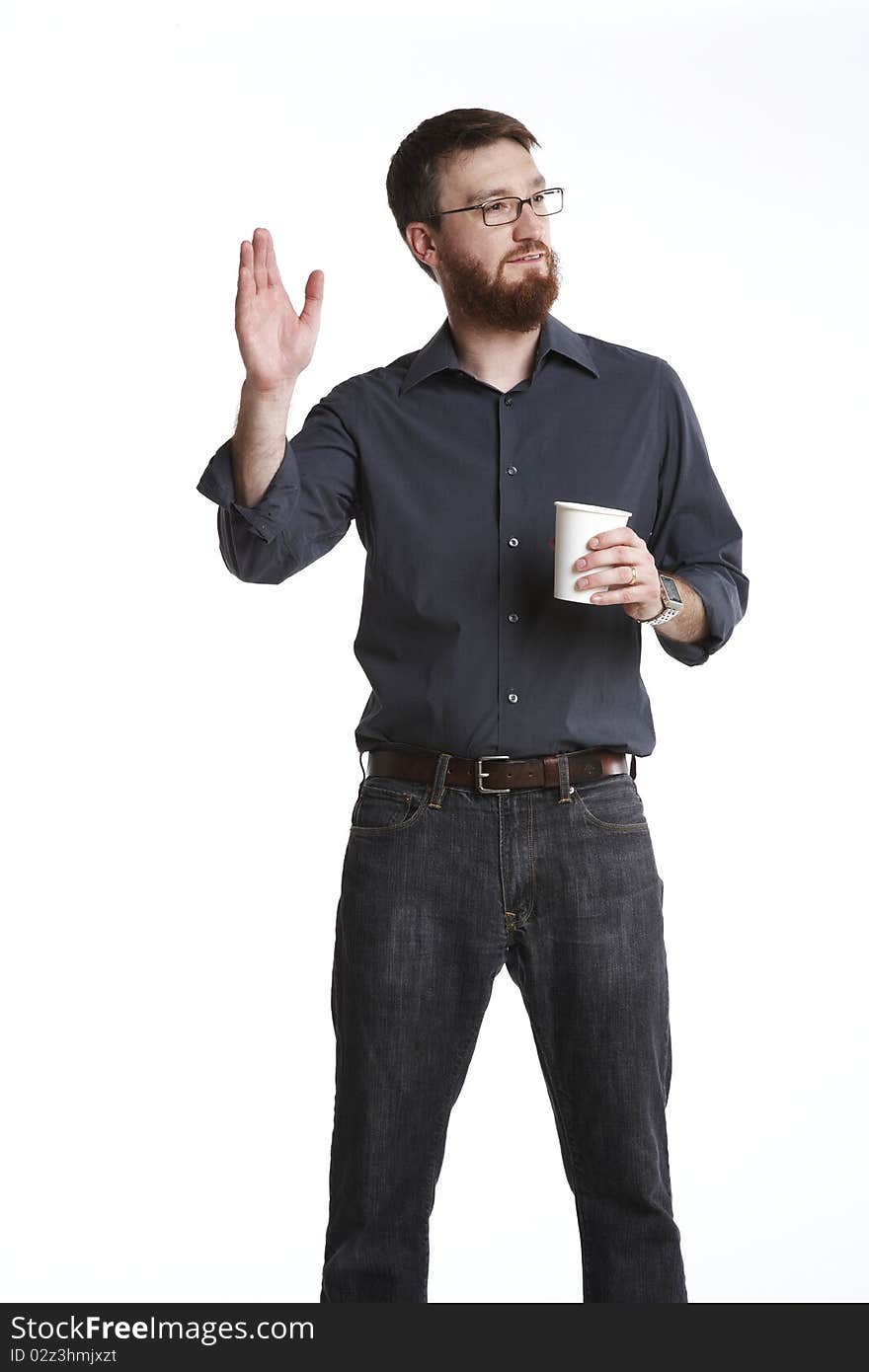 Bearded man standing against white background holding a coffee cup waving. Bearded man standing against white background holding a coffee cup waving