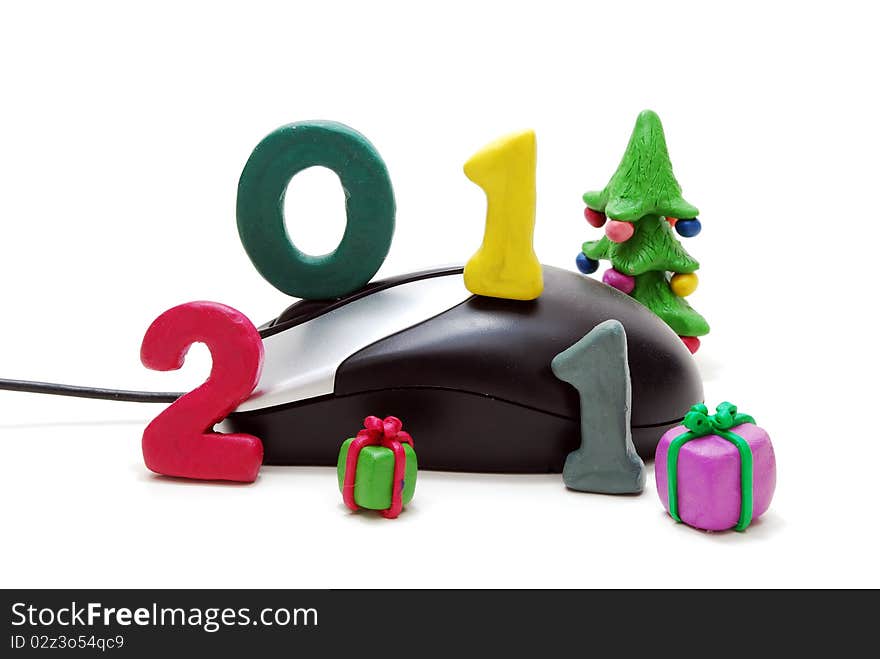 3D New Year Text 2011 with Christmas Tree and Gifts Made of Colored Plasticine and Computer Mouse Isolated on White Background. 3D New Year Text 2011 with Christmas Tree and Gifts Made of Colored Plasticine and Computer Mouse Isolated on White Background