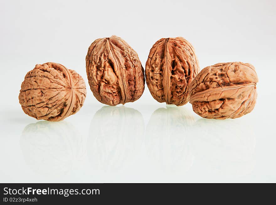 Organic walnut group isolated on white background. Organic walnut group isolated on white background.