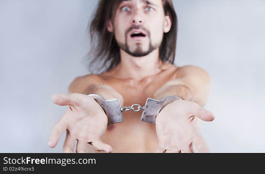 Chained in handcuffs guy