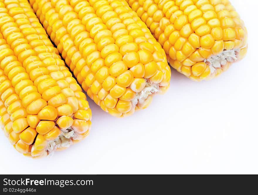 Three pieces of ripe maize. Three pieces of ripe maize